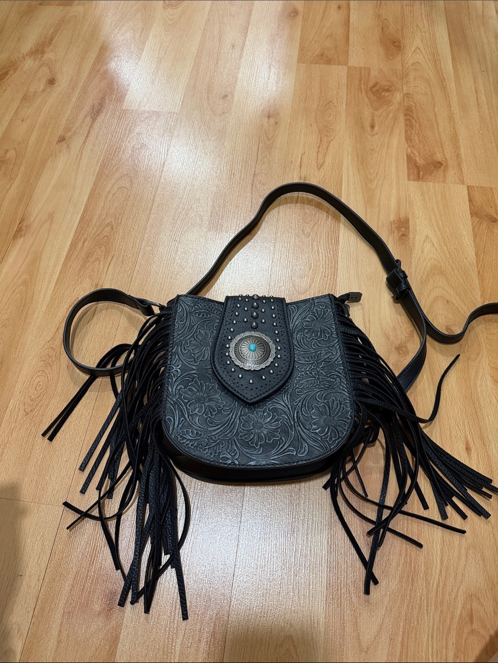 Black Floral Embossed Fringe Crossbody Bag with Concho Accent